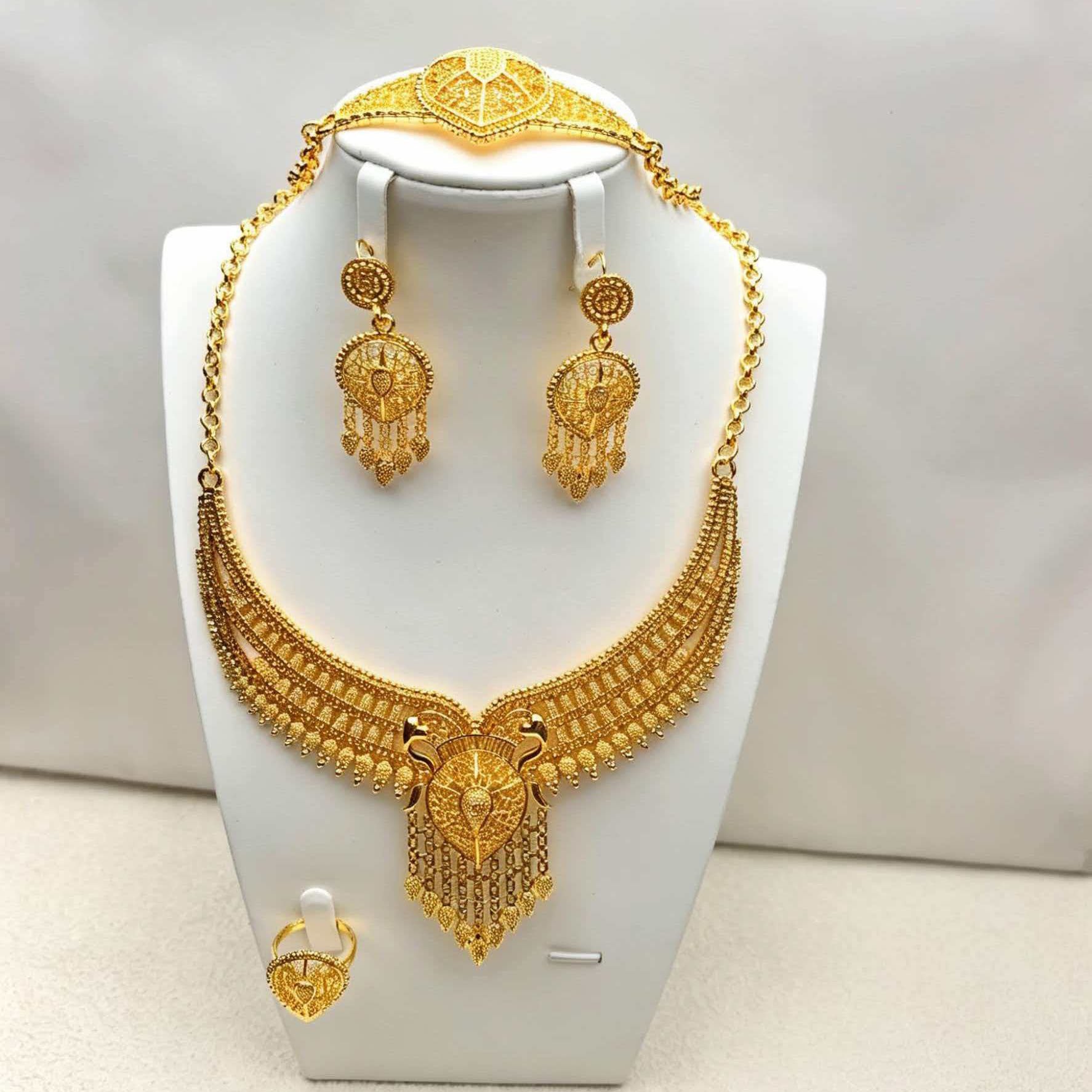 24K Gold Bridal Jewelry Set displayed on bust, filigree bib necklace, headpiece, earrings, and ring