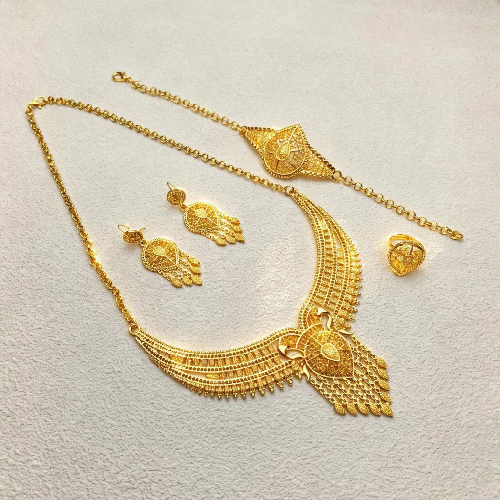 24K Gold Bridal Jewelry Set flat lay showing necklace, headpiece chain, earrings, and ring