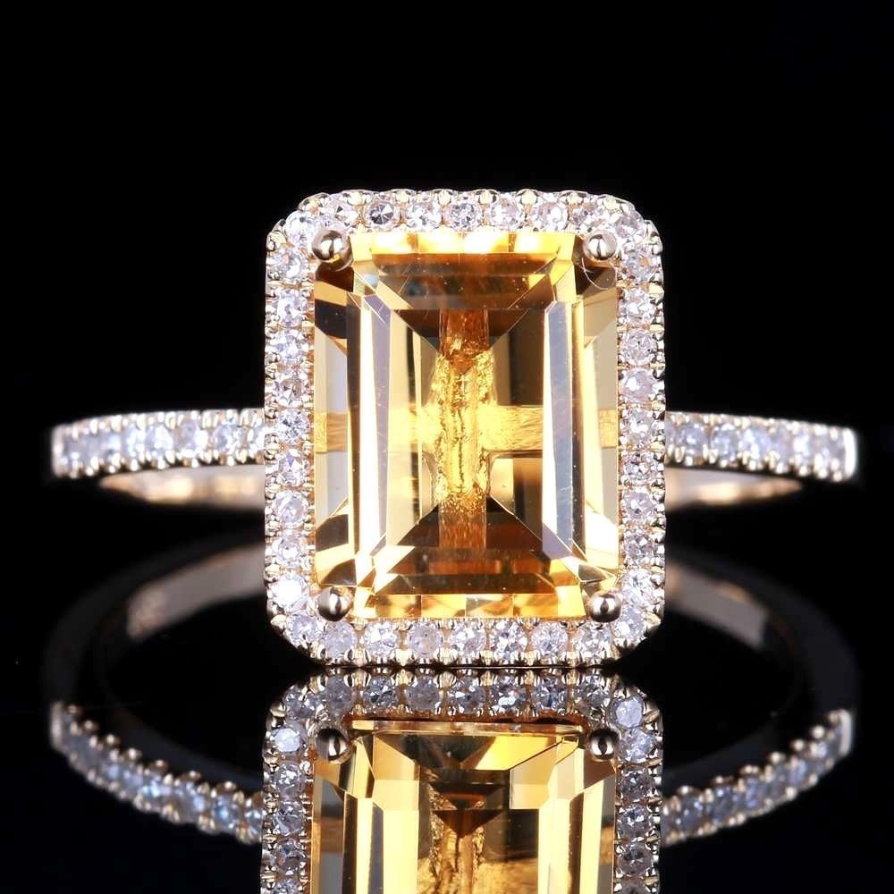 Front view of the Champagne Gemstone Engagement Ring showing emerald-cut halo with reflection
