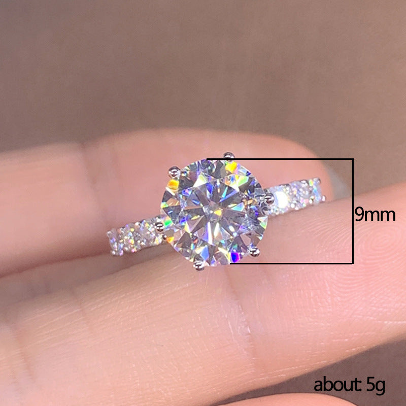 Six-Prong Moissanite Ring size diagram showing 9mm center stone, approximately 5 grams