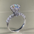 Six-Prong Moissanite Ring - round solitaire engagement ring with pave band, white gold plated