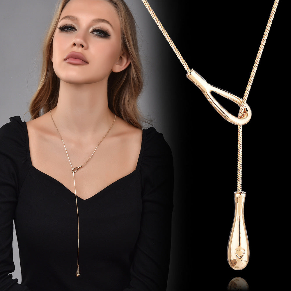 Lariat Snake Chain Necklace worn by model, with close-up of teardrop knot pendant